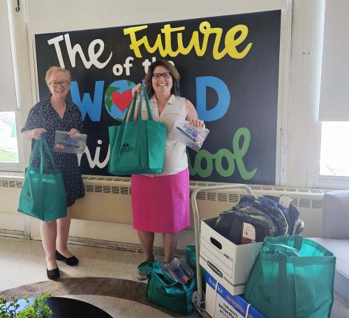 pam knisley and brenda petell drop off school supplies