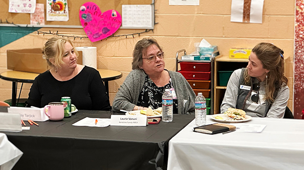 three women at a table