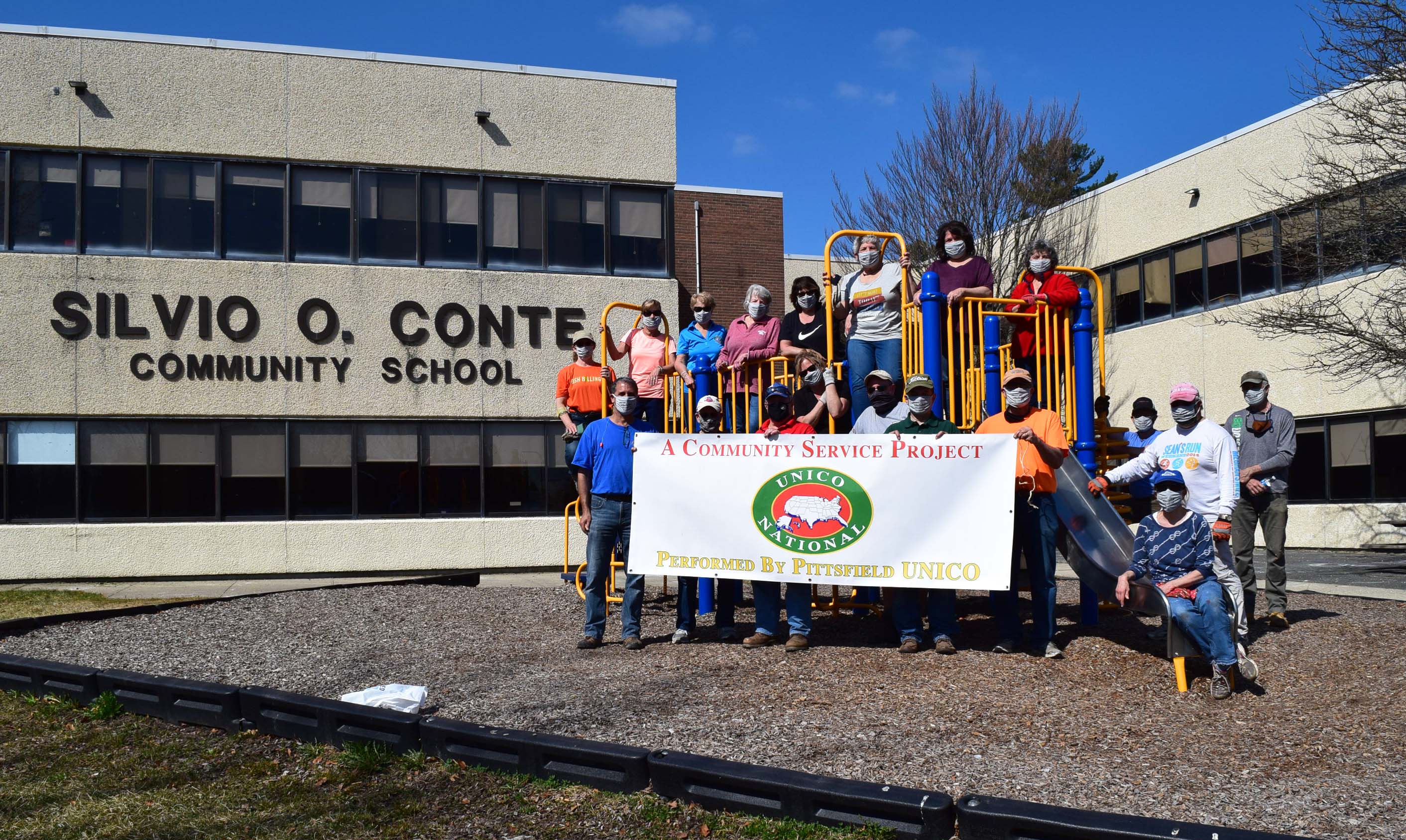 Team from Pittsfield UNICO cleaned up around Silvio O. Conte Community School.