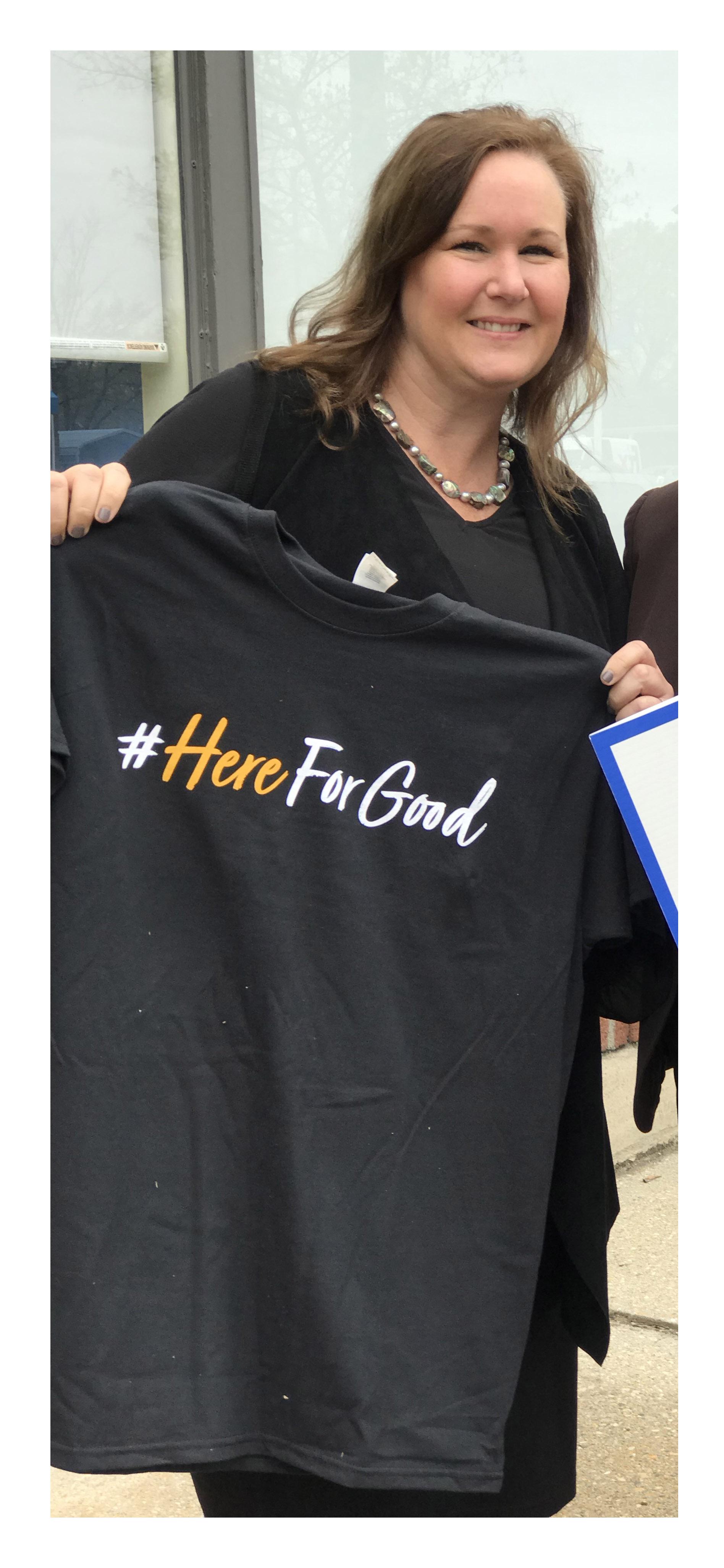 Berkshire United Way CEO holds t-shirt