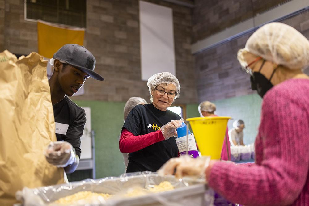 BUW Board member Pat Callahan lends a hand