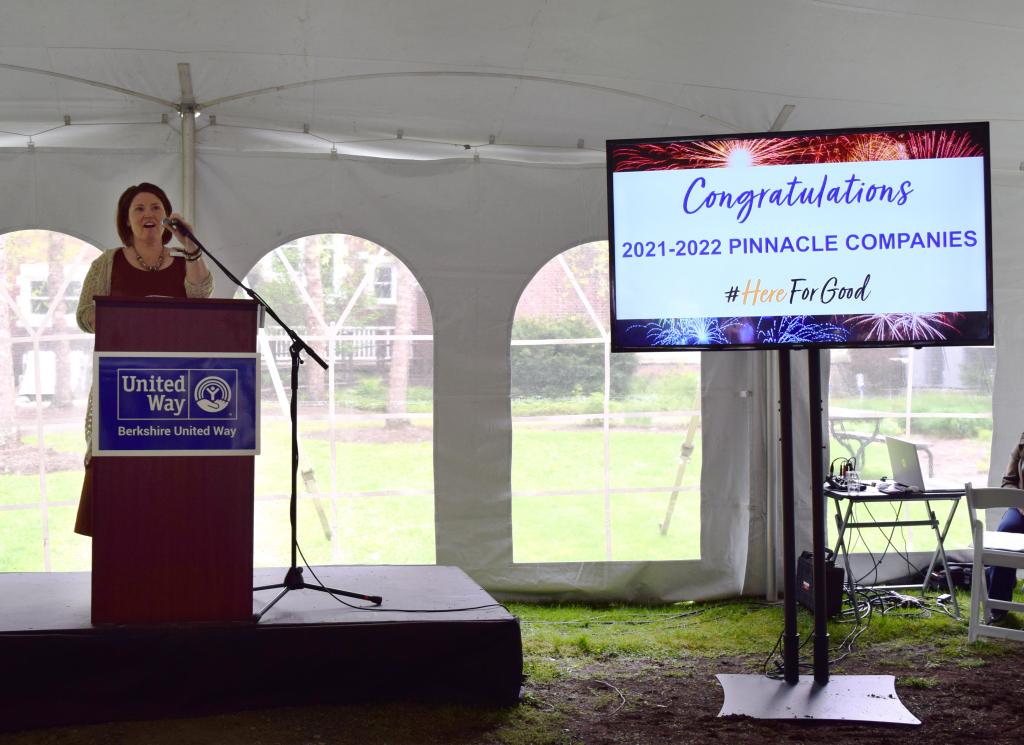 BUW Director of Volunteer Engagement Brenda Petell congratulates our 2021-22 Pinnacle Companies