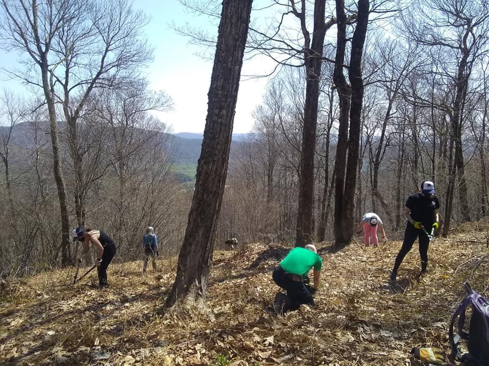 Cleaning up the trail at Alford Springs.