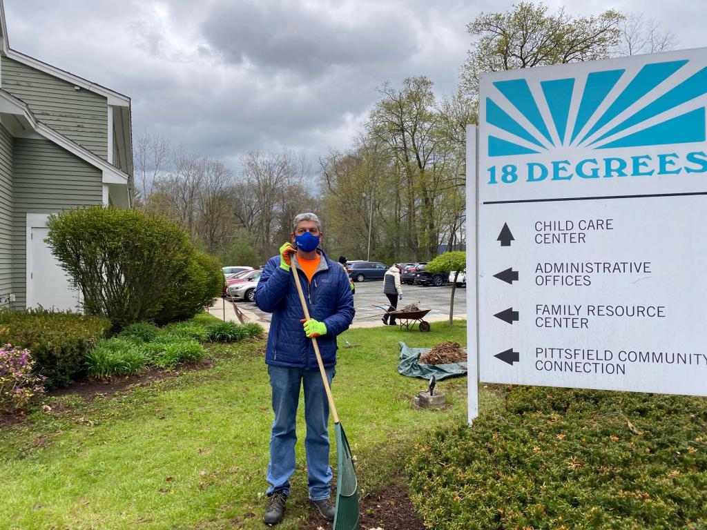 Volunteers with Neenah Technical Materials clean up at 18 Degrees