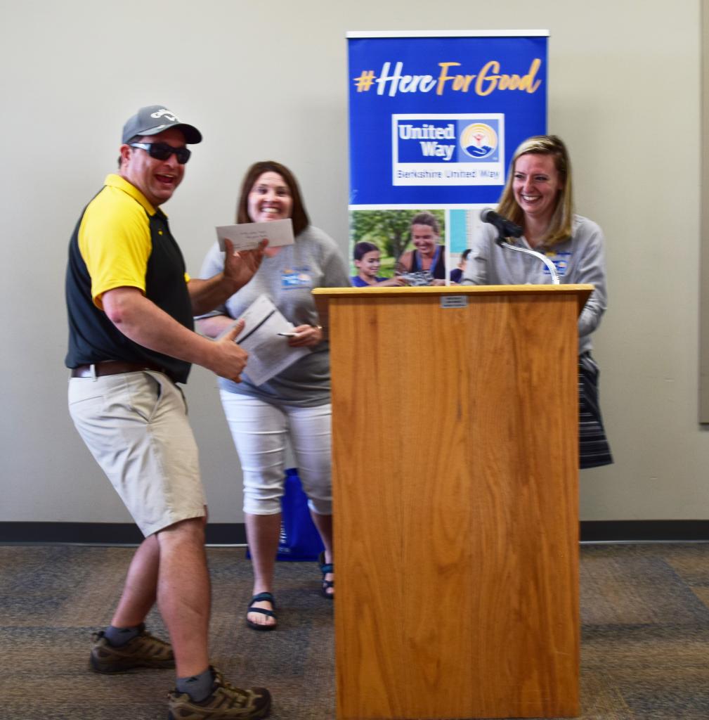 Putting Competition winner Adam Sefchick with Brenda Petell & Anna Worley