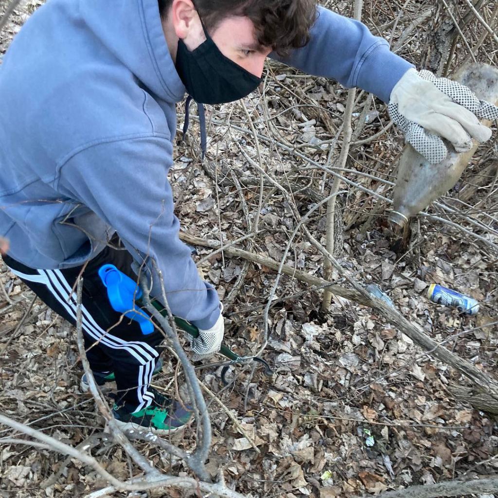 Young volunteer with grassroots group cleanupcrew413 cleans up at Durant Park on April 4.