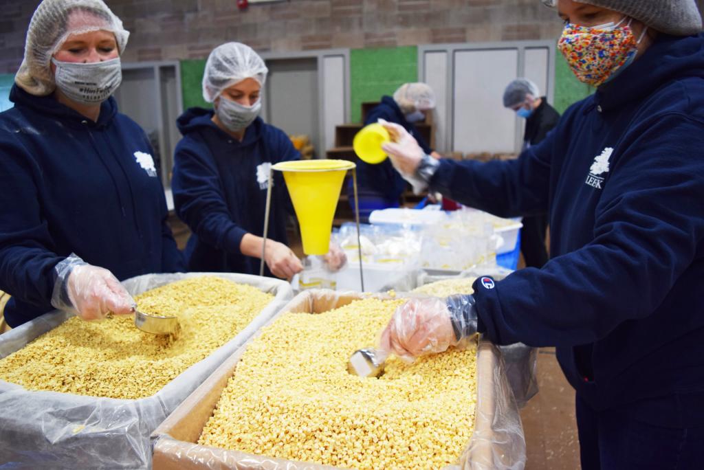 Volunteers from Lee Bank pack up oatmeal