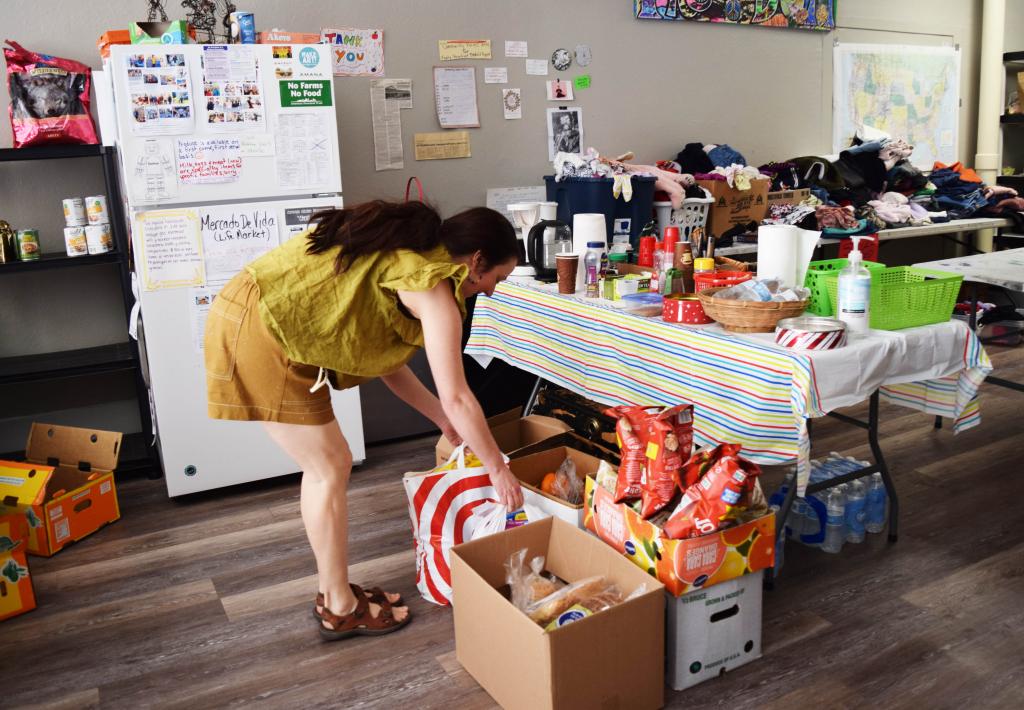 Nicole unloads food at the Roots & Dreams and Mustard Seeds space