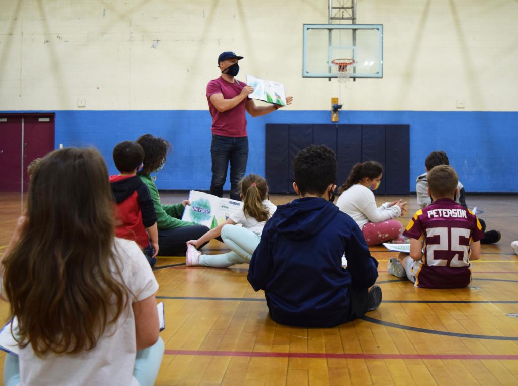 Author Dan Sadlowski reads to the YMCA youth